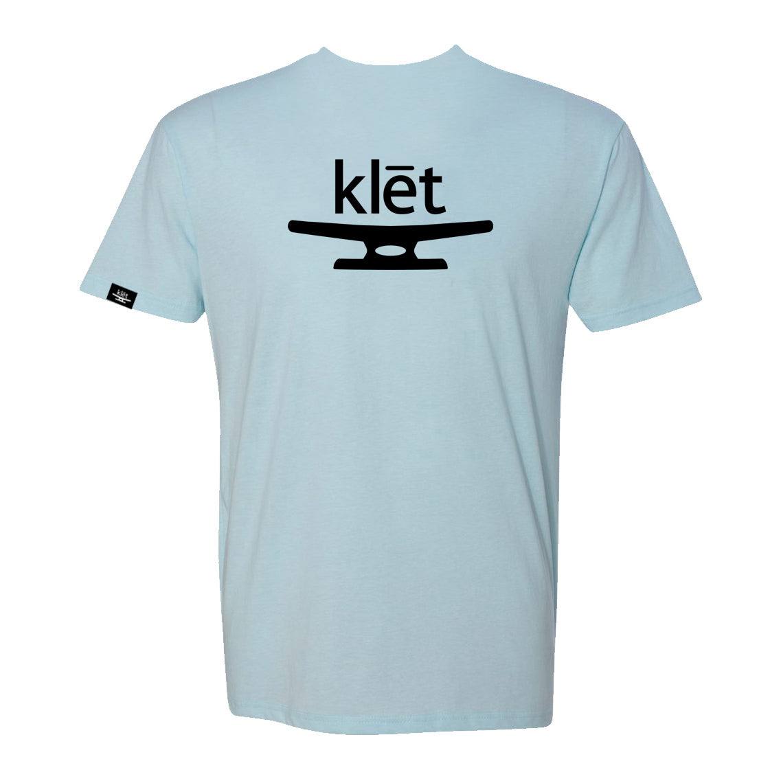 Light blue Klēt brand T-shirt with black logo and design on the back, crafted from soft cotton blend, unisex fit.