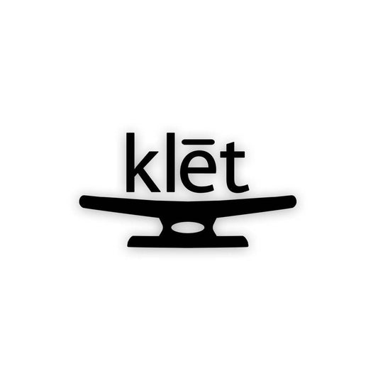 Klēt black and clear sticker with minimalist design symbolizing sea and adventure spirit